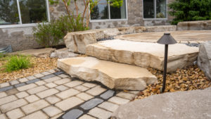 stone staircase with outdoor lights