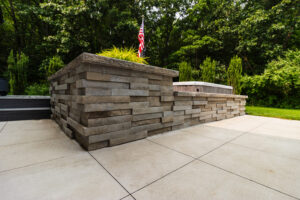 stone wall with American flag