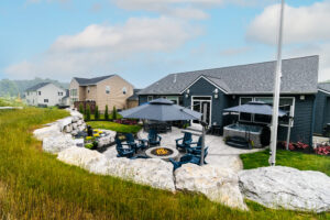 backyard landscape design with firepit back view